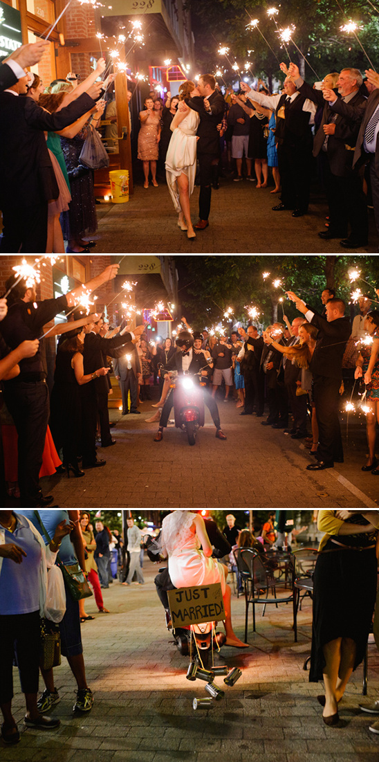 Newlyweds exit wedding with sparklers on scooter