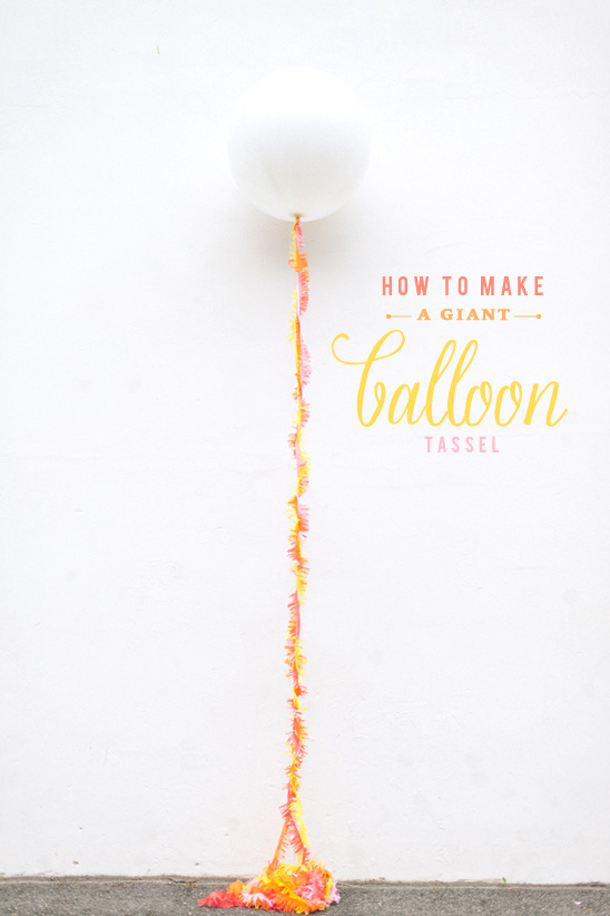 Giant white balloon with colorful tassel tail DIY project