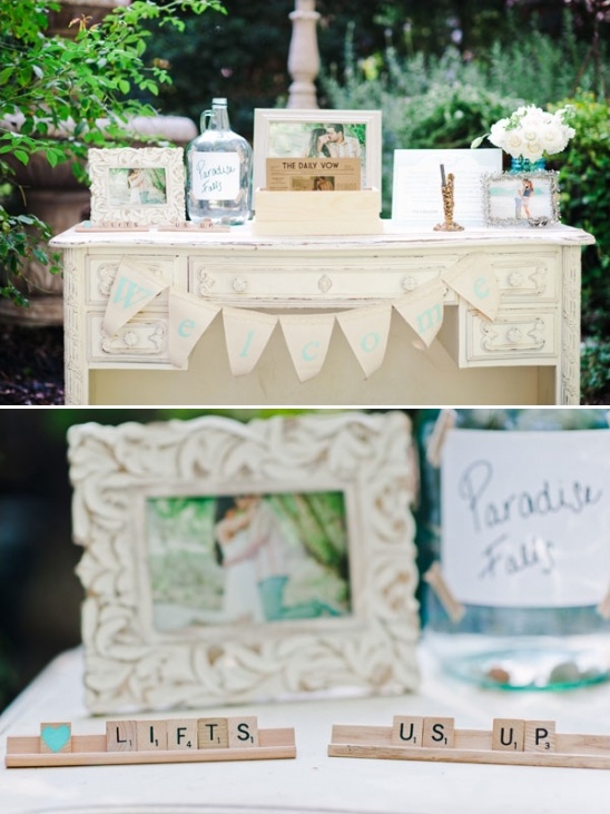 Wedding welcome table with photos and Scrabble tiles