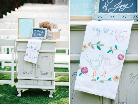 Wedding ceremony decor:  signs, favors, embroidered towel