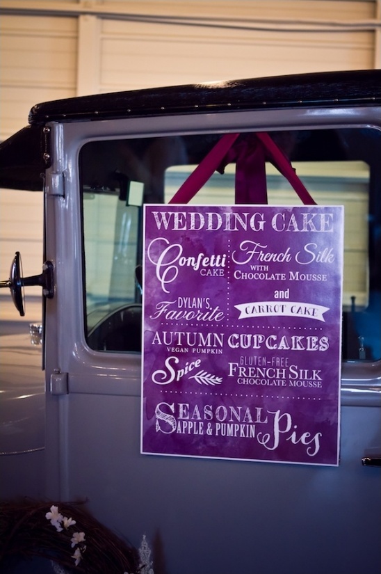 Wedding cake and cupcake menu on vintage car
