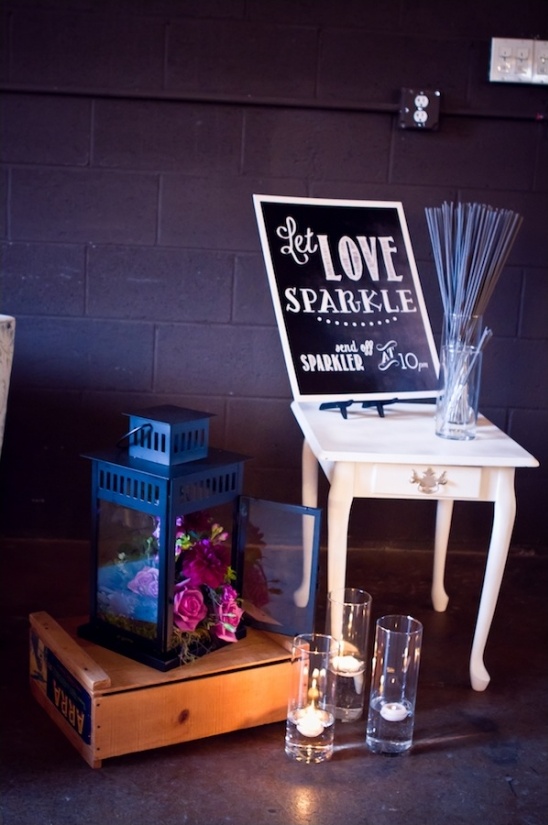 Romantic wedding decor with lantern and sparkler sign