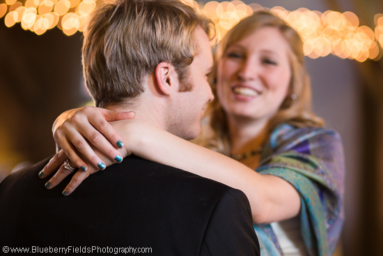 Romantic couple embracing at wedding reception