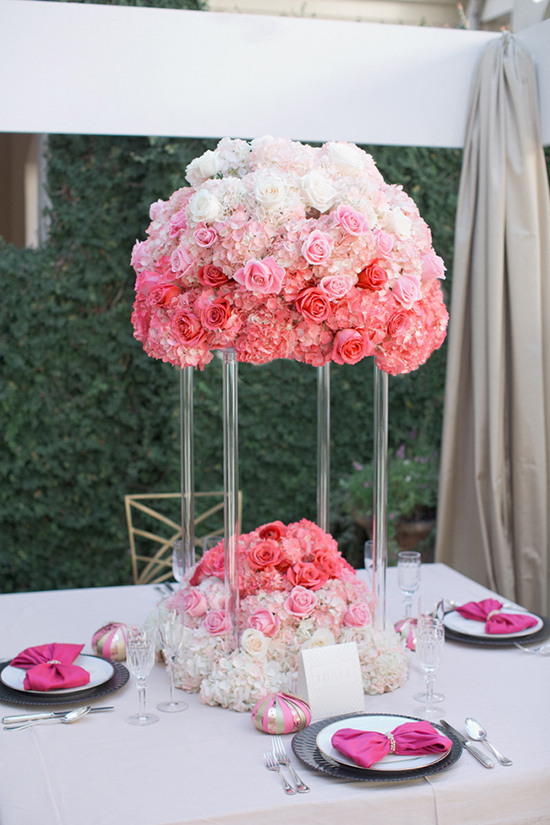 Pink and white ombre rose centerpiece on wedding table