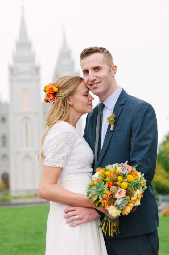 Happy couple embracing after wedding ceremony