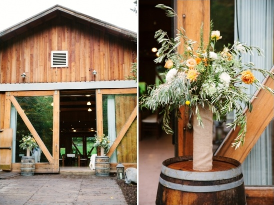 Rustic barn wedding venue with floral centerpiece