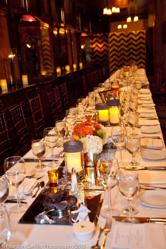 Elegant long table wedding reception dinner setting
