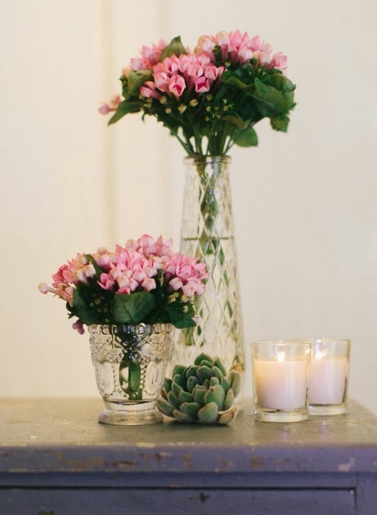 pink floral decor with succulents