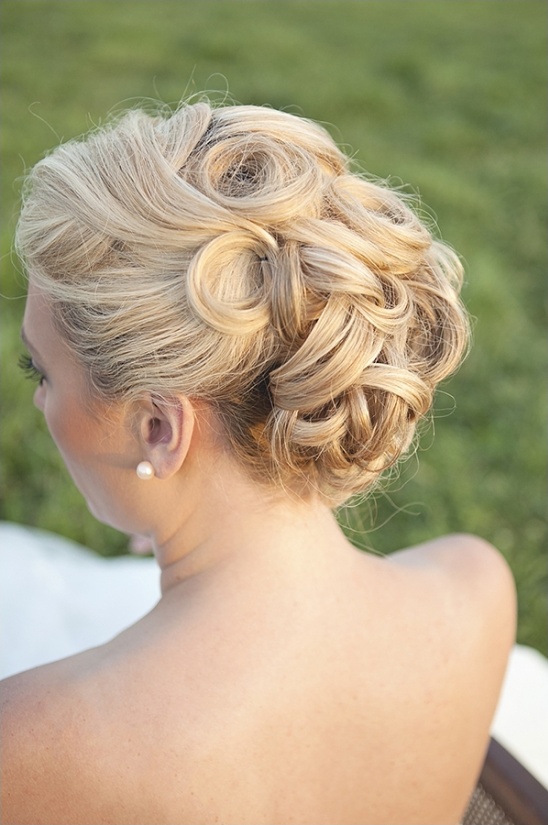 Elegant blonde updo hairstyle for a special occasion