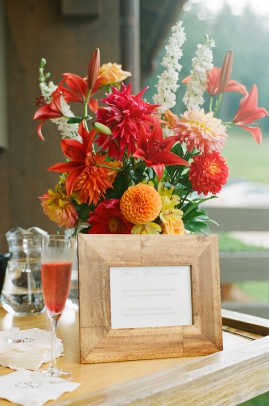 Colorful flower arrangement with menu board