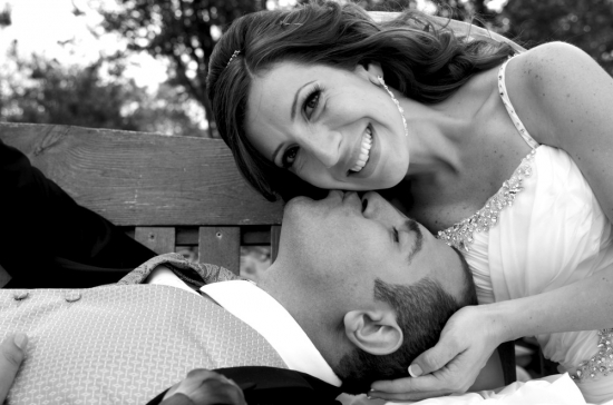 Loving couple's wedding day embrace