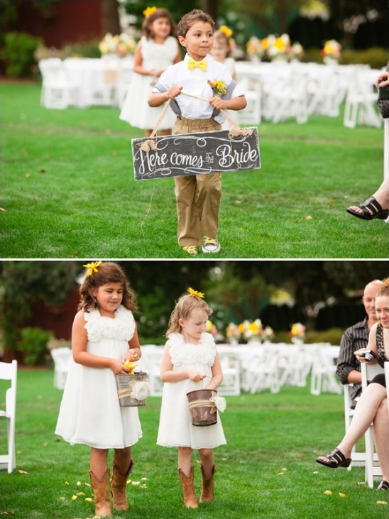 Cute ring bearer and flower girls at outdoor wedding