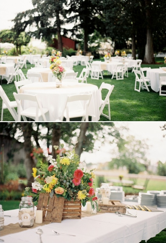 Outdoor wedding reception with tables and floral decorations