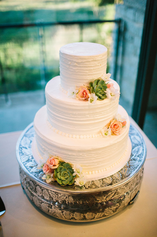 three tier white wedding cake by blue note bakery