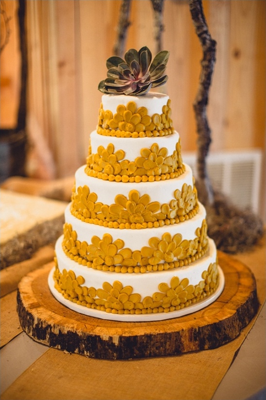 yellow and white wedding cake
