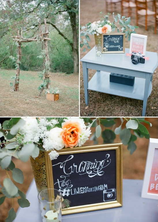 Rustic outdoor wedding decorations with floral arrangements and signage