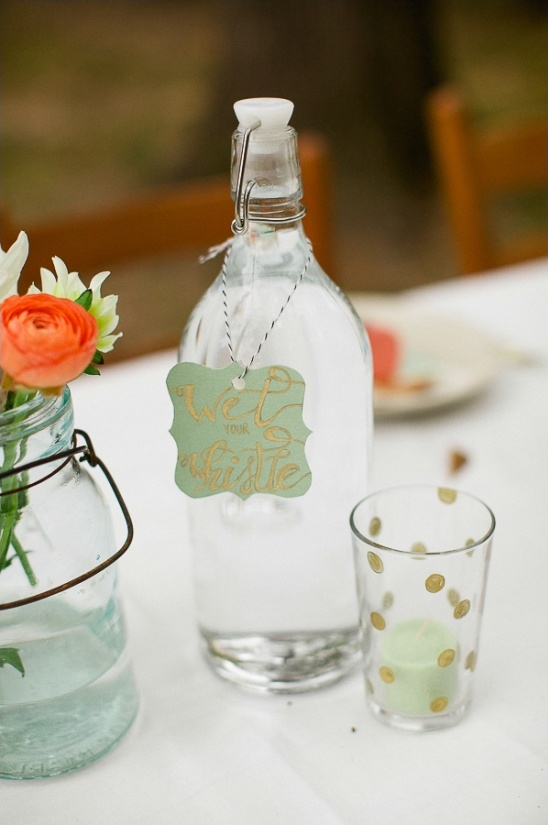 Wedding water bottle with  wet your whistle tag