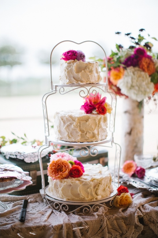 wedding cake on tiered cake stand