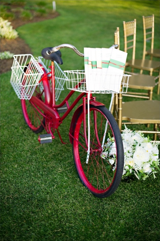 use a bike to hold your wedding programs