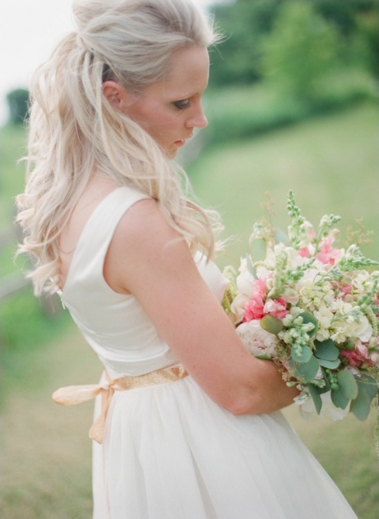 simple white wedding dress with gold sash