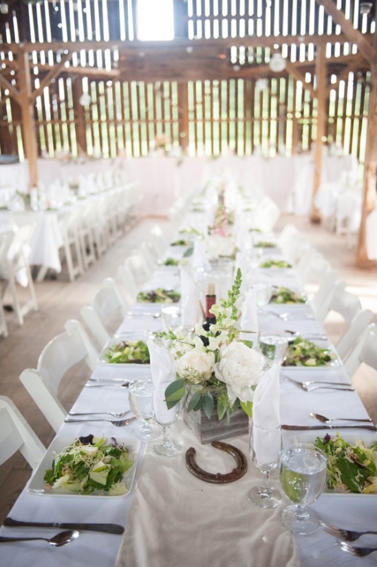swanky dinner party in a rustic barn setting