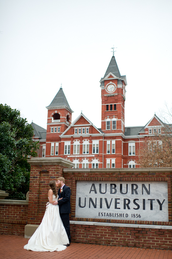 Bride and groom kissing at Auburn University campus wedding