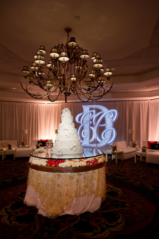 Elegant wedding cake with flowers and chandelier