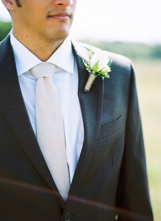 simple white rose boutonniere