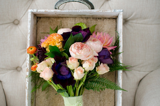 Colorful flower bouquet in a rustic wooden box