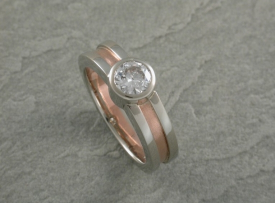 Elegant two-tone ring with a sparkling diamond gemstone design