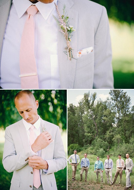 Groom and groomsmen in stylish gray suits and pink ties