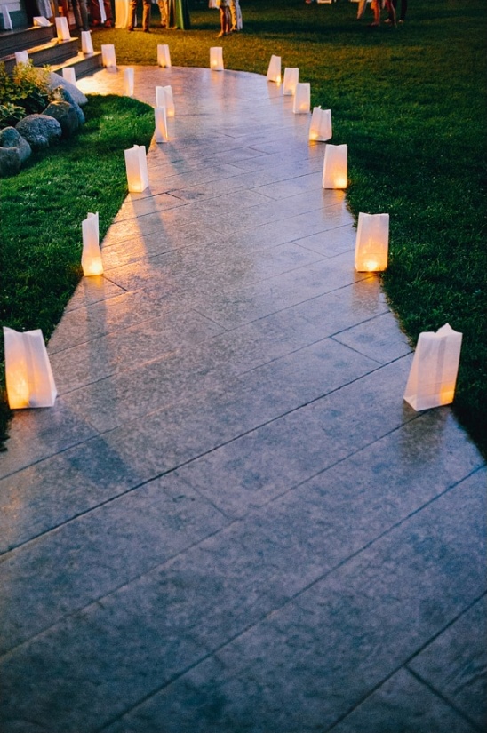 Romantic pathway lit by candlelit paper bags
