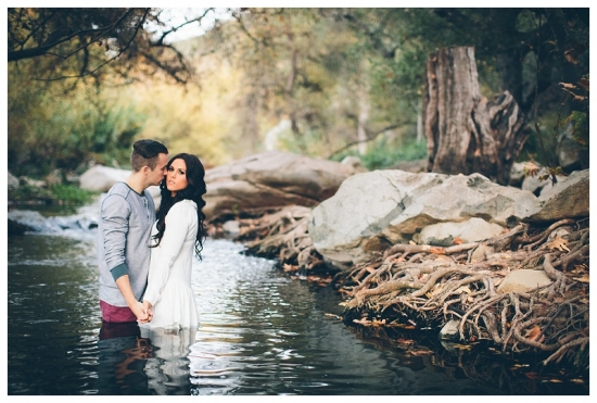 Romantic couple embracing in a tranquil stream