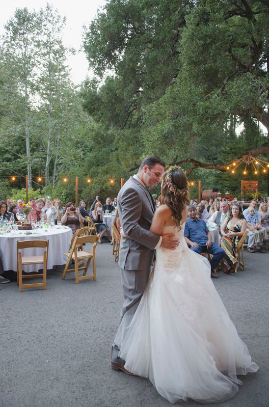 Bride and groom first dance outdoor wedding reception
