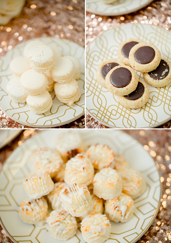 Delicious assortment of cookies and macarons on decorated plates