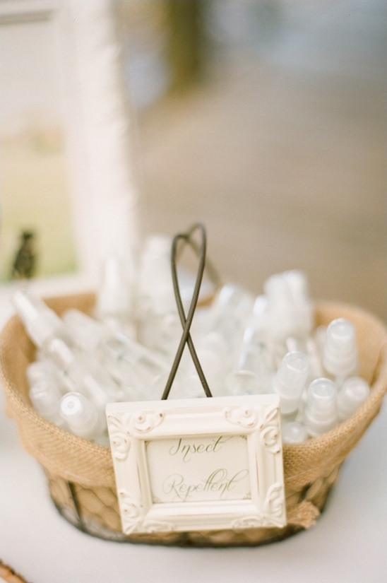 Insect repellent bottles in rustic basket
