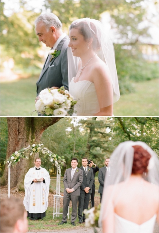 Bride walks down aisle with father towards groom