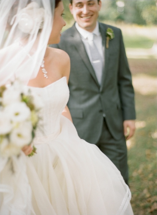 Bride and groom smiling on their wedding day