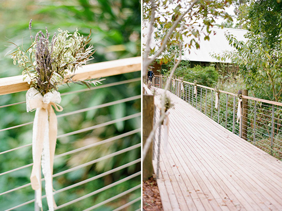 Wedding aisle decor: lavender bouquets on bridge railing