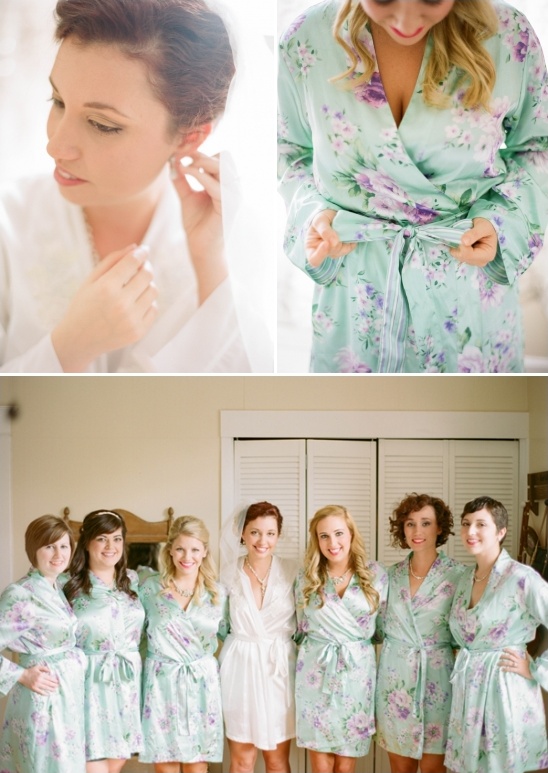 Bride and bridesmaids in floral robes preparing for wedding