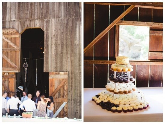 Rustic barn wedding with guests and a cupcake cake