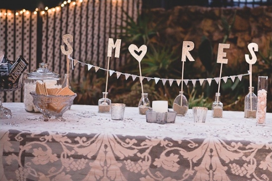 smores tables with gold cut letters