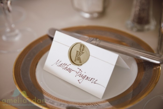 Elegant gold monogrammed place card