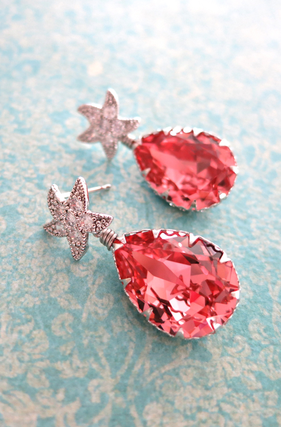 Elegant coral teardrop earrings with starburst tops for a special occasion
