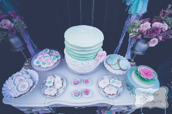 Elegant cake and cookies display for a charming party
