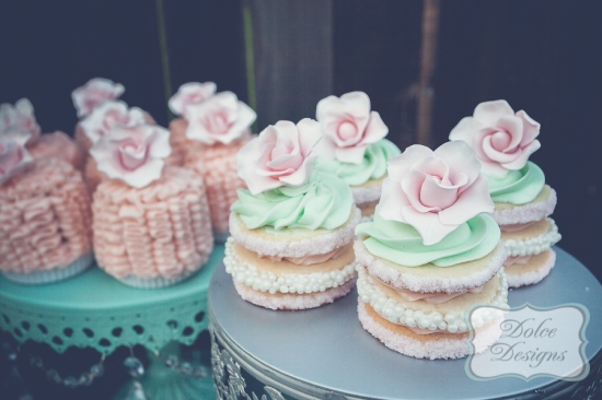 Elegant cupcakes with sugar roses, perfect for a tea party