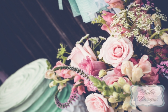 A beautiful bouquet of pink roses and other lovely flowers
