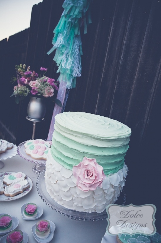 Elegant ombre cake with flower for wedding party