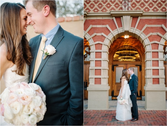 Joyful wedding couple sharing a tender moment in front of building