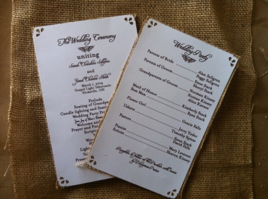Wedding ceremony programs with names and details on burlap